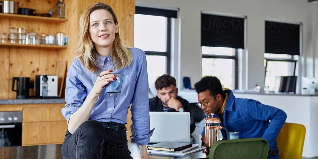 Person reflecting peacefully while journaling and thinking about life purpose and personal growth